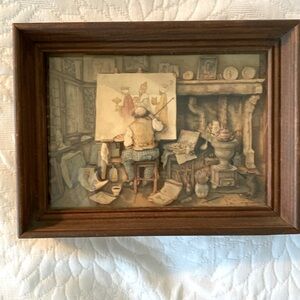 A many dimensional picture of a painter painting the 3 wise men. About 8”by 6”.